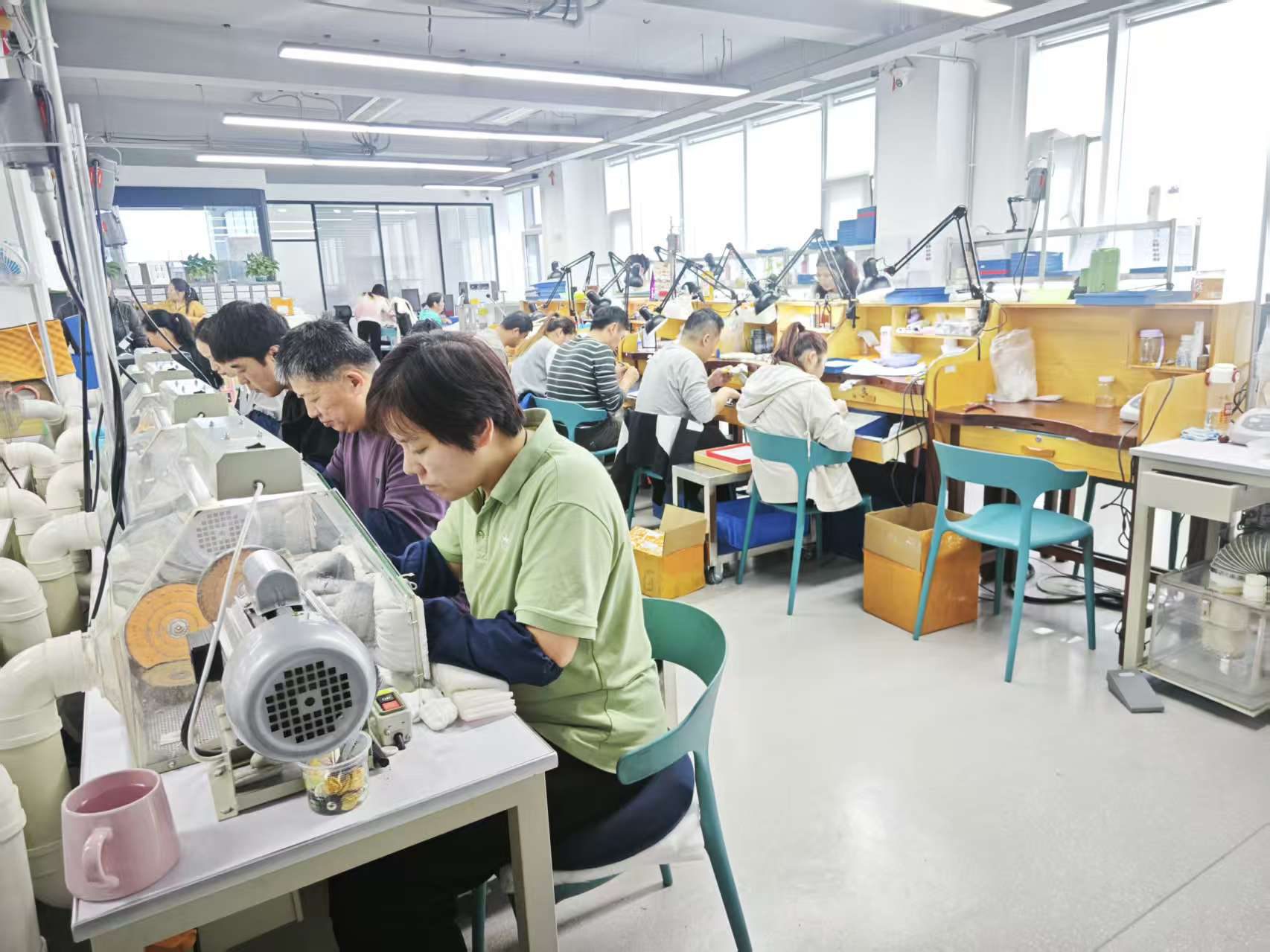 Hibiscus Silver polishing specialists working at finishing machines